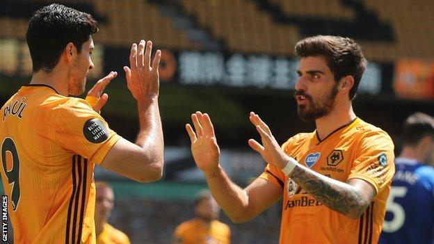 Ruben Neves (right) celebrates with Raul Jimenez