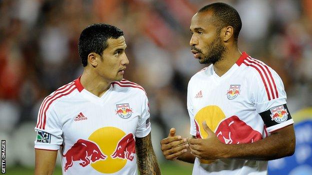 Tim Cahill and Thierry Henry