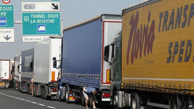 Trucks are stuck in a traffic jam on a highway leading to the Channel tunnel