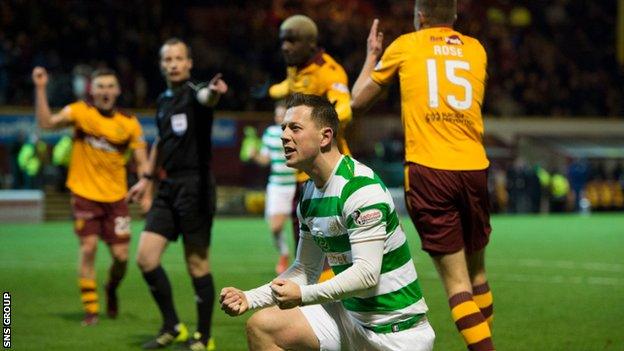 Celtic's Callum McGregor celebrates the award of a late penalty against Motherwell