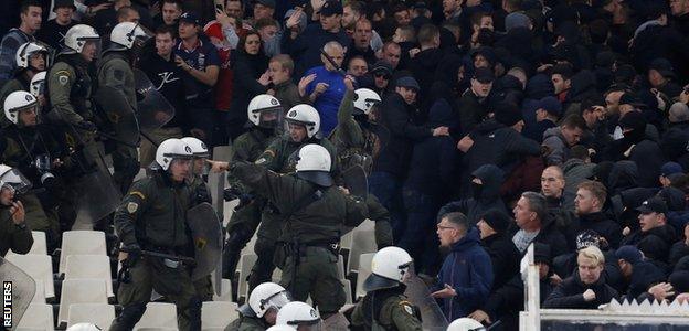 Riot police confronted Ajax fans