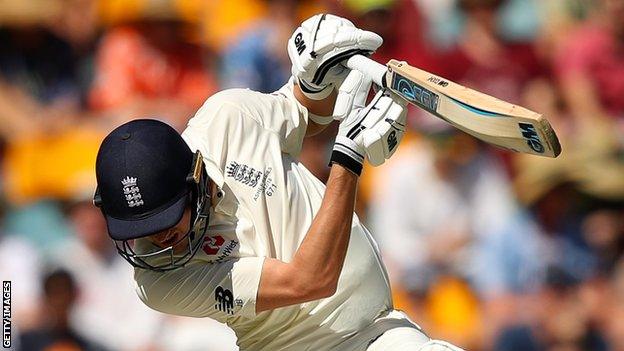 England's Jake Ball attempts to avoid a bouncer in the first Test