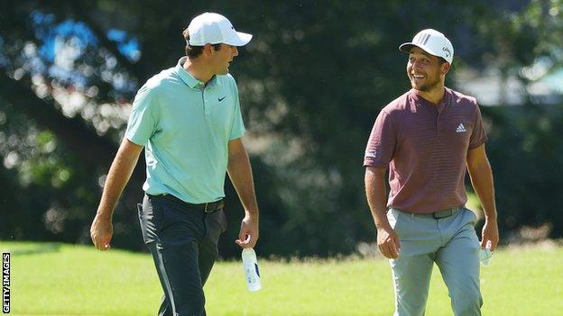 Scottie Scheffler and Xander Schauffele share a joke