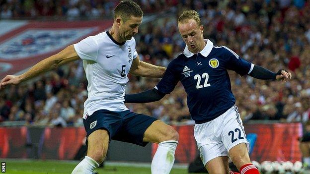 Gary Cahill and Leigh Griffiths (right)