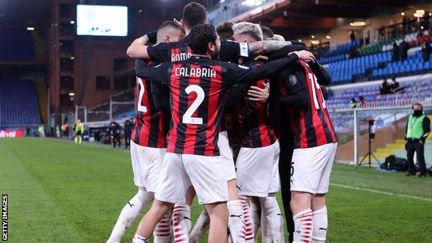 AC Milan players celebrate