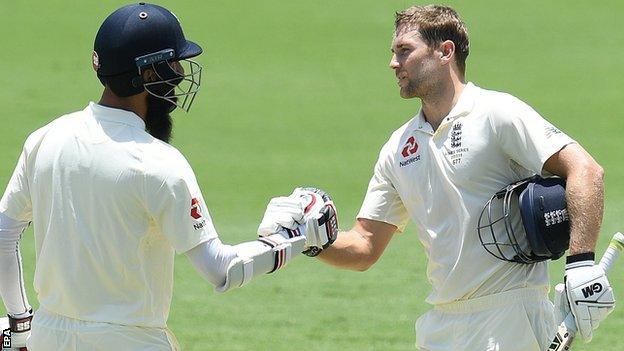 Dawid Malan (right) celebrates his century with Moeen Ali