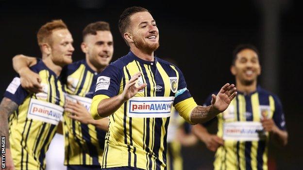 Ross McCormack celebrates a goal for Central Coast Mariners