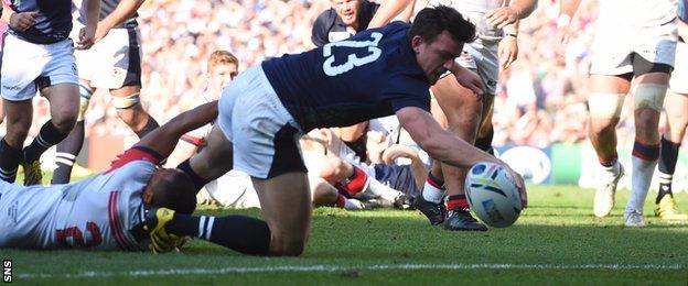 Matt Scott scores a try for Scotland against USA