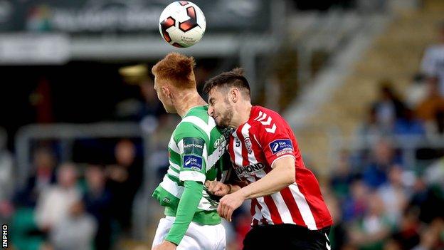 Gary Shaw of Shamrock Rovers and Derry City's Aaron Barry in aerial action at Tallaght Stadium