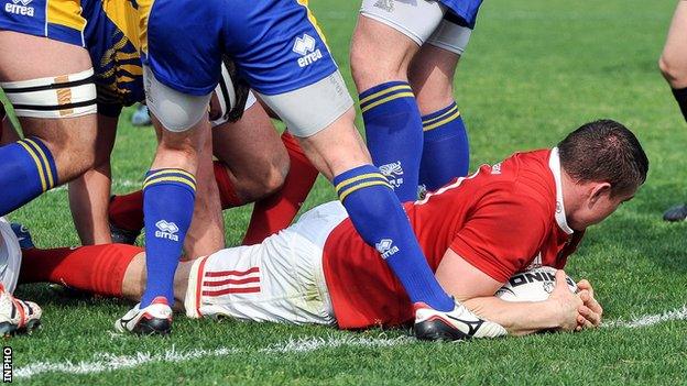 Tommy O'Donnell dives over to score one of Munster's seven tries