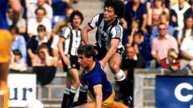 Former England captain Kevin Keegan is tackled by Nigel Pearson in Newcastle's trip to Shrewsbury in 1982