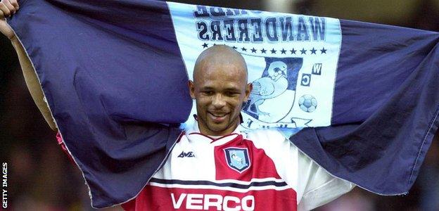 Roy Essandoh celebrates Wycombe Wanderers' FA Cup win over Leicester City