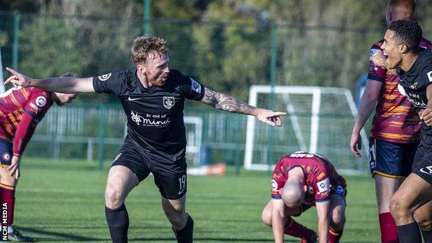 Craig Curran celebrates his late winner