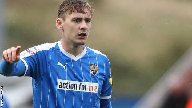 Elliott Hewitt in action for Notts County