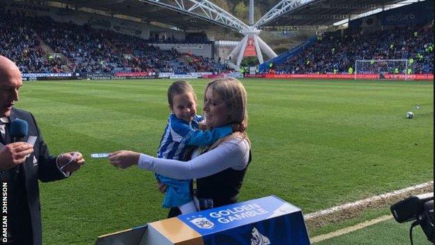 Bella on the pitch at half-time