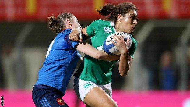 Sene Naoupu of Ireland in action against France's Audrey Abadie in Perpignan