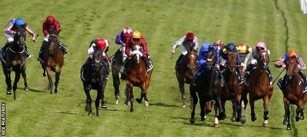 Horses compete in the 2015 Epsom Derby