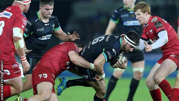 Scarlets and Ospreys in action during their Pro12 derby earlier this season