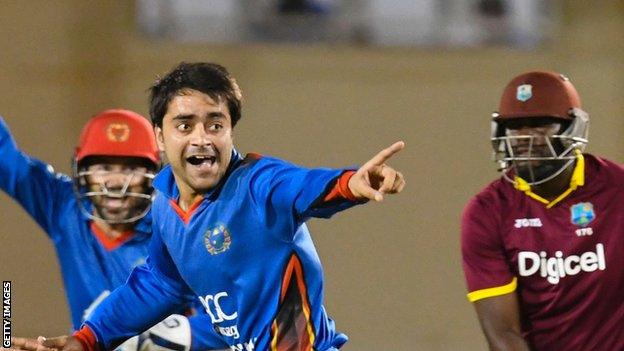 Afghanistan spinner Rashid Khan (centre) celebrates during his country's win over West Indies