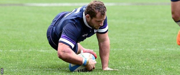 Fraser Brown dives over to score for Scotland