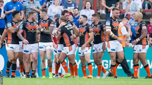 Castleford celebrate Grant Millington's try against Wakefield