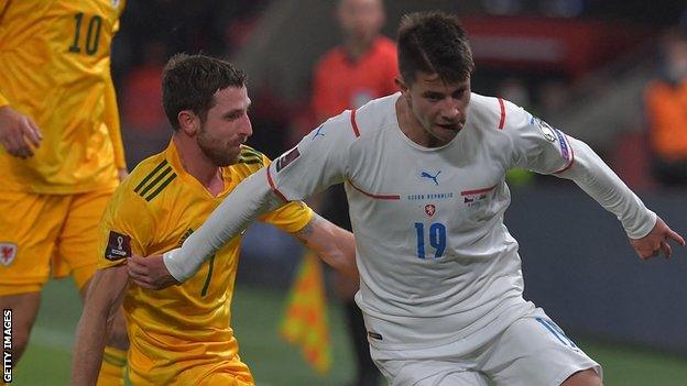 Czech Republic's midfielder Adam Hlozek and Wales' midfielder Joe Allen vie for the ball