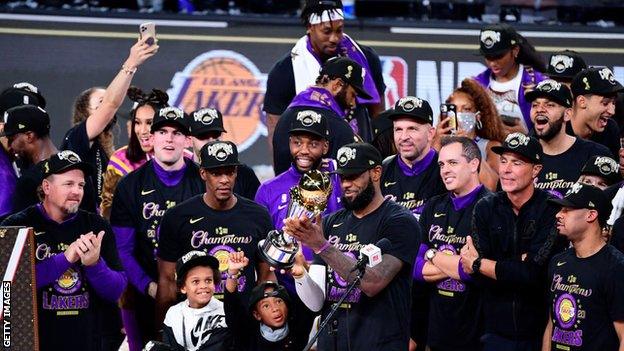 Los Angeles Lakers celebrate with NBA trophy