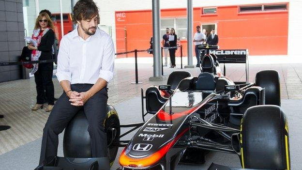 Fernando Alonso and McLaren car