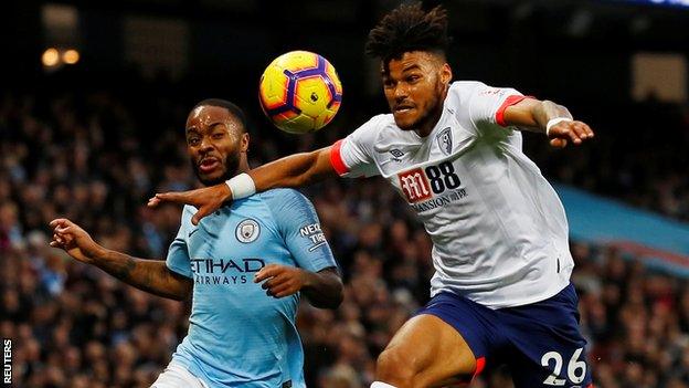 Raheem Sterling and Tyrone Mings