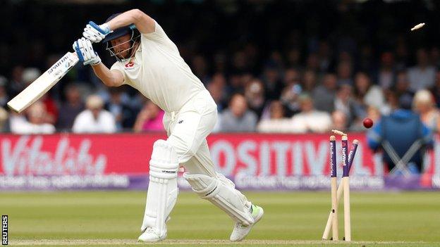 England's Jonny Bairstow is bowled