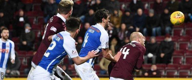 Steven Naismith (right) scores his first goal for Hearts