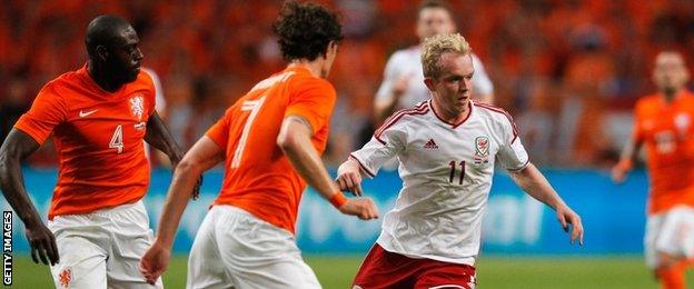 Jonny Williams in action against Netherlands in 2014