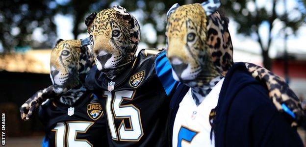 Jaguars fans walk to Wembley Stadium