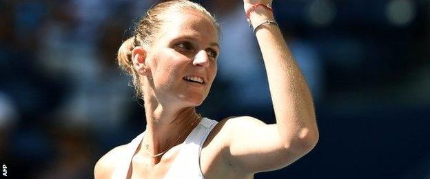 Karolina Pliskova celebrates after victory in under an hour