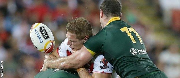 Tom Burgess tackled