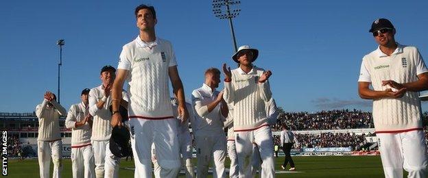 England leave the field after day two