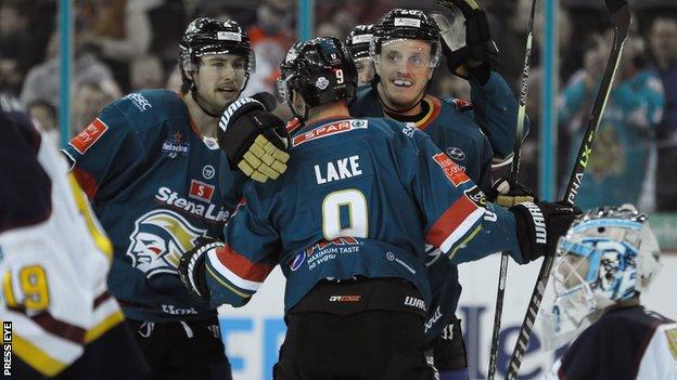 Ben Lake is congratulated by his Giants team-mates after scoring their second goal in the first period