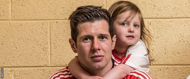 Tyrone senior football captain Sean Cavanagh with his daughter Eva