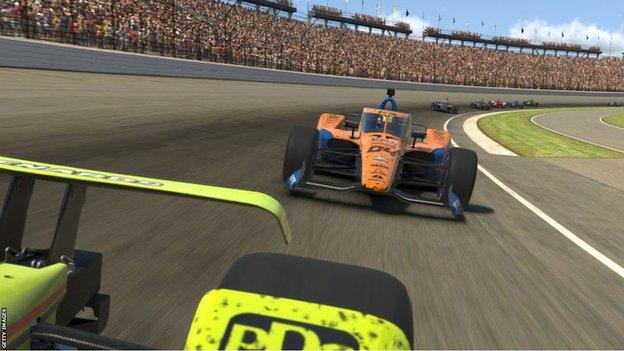 Lando Norris taking part in an esport race