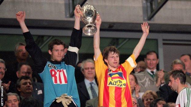 Nantes captain Mikael Landreau (left) and Calais skipper Reginald Becque lifted the trophy together