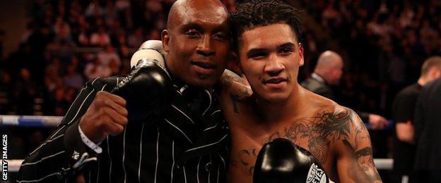 Nigel Benn and his son Conor after making his professional debut