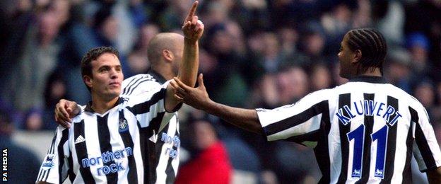 Laurent Robert (left) celebrates scoring for Newcastle