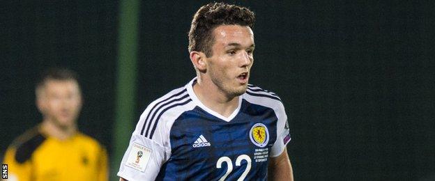 Hibernian midfielder John McGinn in action for Scotland