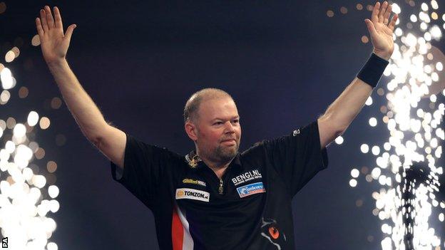 Raymond van Barneveld celebrates beating Phil Taylor