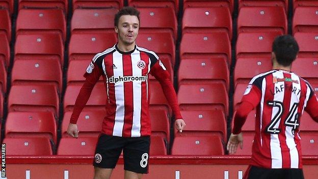 Stefan Scougall celebrates a goal for Sheffield United