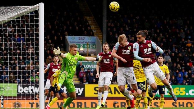 Ben Mee and Jay Rodriguez attack the Arsenal goal