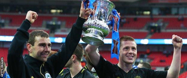 James McArthur and James McCarthy celebrate winning the FA Cup with Wigan Athletic