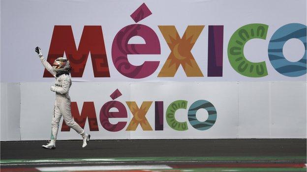 lewis hamilton celebrates victory in mexico