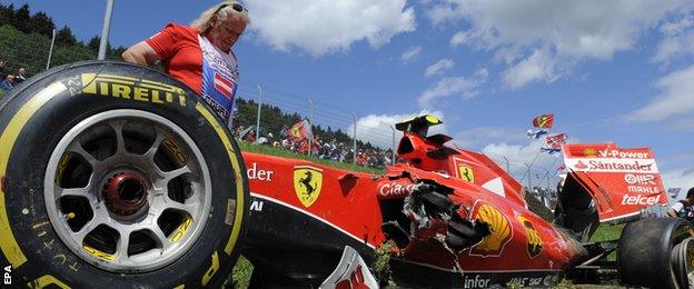 Kimi Raikkonen's Ferrari was involved in a dramatic crash with Fernando Alonso on the first lap