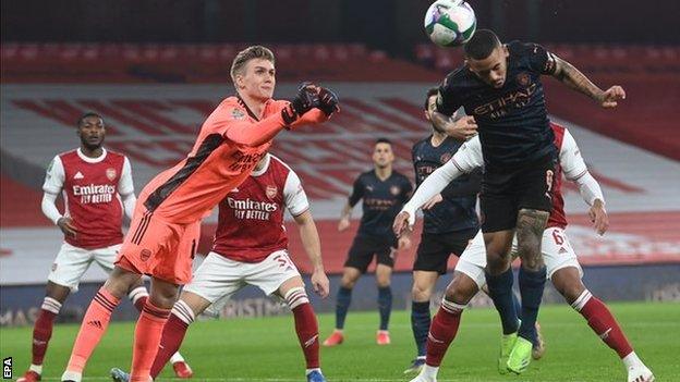 Manchester City's Gabriel Jesus heads his side's opening goal against Arsenal in the Carabao Cup